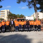 Varios de los voluntarios posan en el párking del Palau de Congressos.