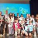 Foto de familia de los ganadores y las ganadoras, además del jurado