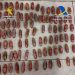 Los 'dátiles' o pequeños paquetes con la droga que el hombre había ingerido y que expulsó en el hospital Son Espases.  Foto Guardia Civil.