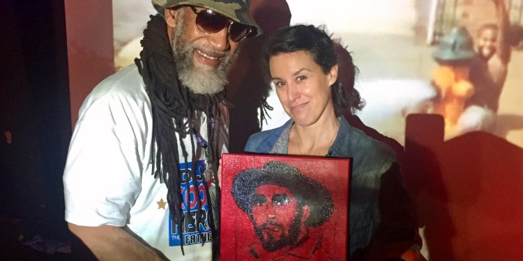 Aida Miro con Kool Herc, en Nueva York.