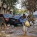 Vista de una calle afectada en Paiporta, tras las fuertes lluvias causadas por la DANA. EFE/Manu Bruque