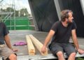 Los tres socios y amigos, sobre un escenario en uno de sus trabajos