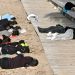 Jóvenes durmiendo en la playa de ses Figueretes. Fotos Noudiari.es
