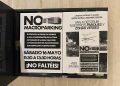 Carteles de la convocatoria en los edificios de la zona.