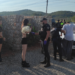 La Policía Local de Santa Gertrudis registra a asistentes a la fiesta.