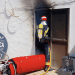 Bomberos de Formentera actuando en el cuarto de contadores afectado por el fuego. Consell de Formentera